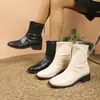 Botas femininas estilo Martin com bico redondo e salto grosso, botas versáteis para primavera e outono de 2026, novas botas elásticas justas de cano médio estilo europeu e americano