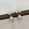 Brincos de pérolas elegantes com laço vintage 2025, novos brincos de design de nicho de alta qualidade