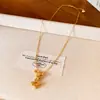Collar de flor de circón bañado en oro real de 14k, cadena de clavícula estilo commuter exquisita, joyería de lujo ligero de alta gama para mujer al por mayor