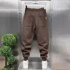Novidade de Outono Calça de Moletom Esportiva Bordada com Letras para Homem Moda Tendência Cintura Elástica Jogger Harem Slim Casual