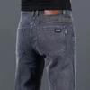 Calça jeans masculina reta e solta Guangzhou Xintang, outono e inverno, de alta qualidade, preta, elástica, para todos os tipos de uso, casual