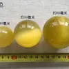 Venta al por mayor de fábrica de adornos coloridos de ojo de gato, adornos para sala de estar, juego de balonmano, piedra de ojo de gato, bola de cristal, bola de Feng Shui