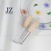 Tubo de brillo de labios biselado cuadrado hecho a medida Jinze con anillo central, 6 ml/7 ml, empaque de tubo vacío de plástico