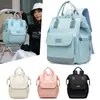 Bolsa de mamá de nuevo estilo, gran capacidad, moderna para viajes de maternidad, almacenamiento de leche aislado, mochila para madre y bebé