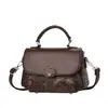 Bolsa pequena moderna para mulheres, novo modelo da primavera de 2026, bolsa quadrada pequena de ombro único e transversal, fresca e doce, versátil, moderna e simples