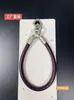 Nova pulseira de couro triangular com fivela dupla para celular, acessório universal, pulseira simples com fivela dupla, corrente de suspensão anti-queda