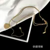 [56] logotipo de comercio exterior sin marca acero de titanio joyería Europa y Estados Unidos variedad de hip-hop apilado collar de clavícula de acero de titanio