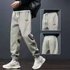 Calça Masculina 2025 Novo Estilo Outono e Primavera Calça Esportiva Alta Masculina Outono Fleece Espessado Casual Jogger Calça de Moletom