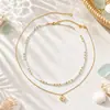 Collar de doble capa con colgante en forma de corazón para mujer, chapado en cobre con oro de 18 quilates, electrochapado con perlas y bolitas de oro pequeñas, dulce cadena para la clavícula de uso diario