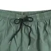 Shorts Casuais Esportivos Europeus e Americanos Cross-Border de Quatro Vias Stretch, Cor Sólida Soltos, Outono 2025, Secagem Rápida, Shorts de Praia para Homens