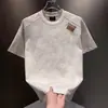 Moda Verão 2025 Europeia Luxo Leve Marca Tendência Personalizada Bordada Gola Redonda Manga Curta Camiseta Fresca para Homens