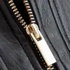 Ins atacado de roupas femininas estilo europeu e americano 2026 Outono Novo Versátil High-End Marca Pequena Design Jaqueta de Couro PU Bicolor