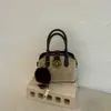 Bolsa de mão de nicho transfronteiriça com acabamento fosco retrô para mulheres, nova bolsa tote estilo coreano para o outono de 2026, bolsa de ombro e bolsa transversal versátil