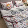 Conjunto fresco y lindo de cuatro piezas de hilo de pompón con ribete de pompón funda nórdica ropa de cama Nantong dormitorio estudiantil conjunto de tres piezas 4