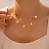 Collar con colgante de borlas irregulares transfronterizo, estilo europeo y americano, chapado en acero de titanio y oro de 18 quilates, cadena de clavícula ligera de lujo que combina con todo.