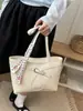 2026 Verano Nuevo Bolso Tote de Gran Capacidad para Viajes Cotidianos Estilo Coreano Simple Estilo Ins Bolso de Mano Cruzado al por Mayor Bolso para Mujer