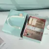 Nueva caja de regalo caja de cajón azul claro caja de perfume caja de embalaje para productos de cuidado de la piel caja de regalo para la mano mariposa compañera pequeña y fresca