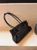 Bolso de mano de cuero de diseño estilo coreano 2026 con hebilla, bolso de piel de vaca, bolso bandolera retro de un solo hombro para mujer, gran capacidad