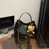Bolso de Cadena de Moda y Sencillo para Mujer Otoño e Invierno 2025 Nuevo Bolso Cruzado de Hombro Casual Bolso Cubo de Moda para el Trabajo