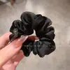 Elegante sentido de alta gama anillo para el pelo de intestino grueso pelo flor de cabeza de diamante negro cuerda de pelo de cuero 2024 nuevos accesorios para el pelo