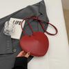Bolsa de design de nicho têxtil da moda feminina 2025, novo estilo, popular, bolsa transversal, mini bolsa em formato de coração, bolsa de axila