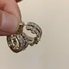 Pendientes de Cruz Metálicos con Microincrustaciones de Circonita de Diseño de Nicho Estilo Fresco Ins Versátiles para el Trabajo Pendientes de Nariz de Cerdo para Mujer