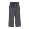 Pantalones casuales nuevos para hombre para trabajo al aire libre, resistentes al agua, con diseño dividido, pantalones largos y cierre ajustable de cuatro botones.