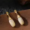 Brincos de Resina em Forma de Gota Personalidade da Moda Transfronteiriça Estilo Maillard, Brincos de Commuter Leve Luxo Modernos para Afinar o Rosto