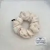 Gomas para el cabello brillantes y lustrosas estilo coreano para mujer, con un diseño plisado, material elástico que no daña el cabello y un aspecto de alta gama para coletas.