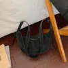 Bolso grande de mujer sencillo para comercio exterior, nuevo bolso casual retro tipo bola de masa 2026, bolso casual de hombro y cruzado para el día a día