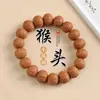 Artículos de Venta Caliente en Transmisión en Vivo: Pulseras de Nogal con Plumas de Fénix Hechas a Máquina, Pulseras Octagonales Espalda de Tiburón de Pekín, Pulseras de Lujo con Cabeza de Mono, Joyería para Hombre de Estilo Étnico