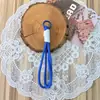 Cordón trenzado de fábrica para teléfono móvil, colgante, cuerda para la muñeca, cadena de teléfono móvil colorida, llavero, cuerda para la muñeca de bolso de moda, venta al por mayor