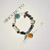 Pulsera de Cerámica Jingdezhen Nueva Historieta China Pulsera Boutique Venta al por Mayor Estudiante Joker Explosiones Puesto del Mercado Nocturno Pulsera