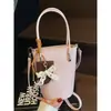 Bolso tipo cubo de moda para mujer 2026 nuevo estilo moderno retro bandolera versátil