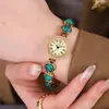 Goldie de Segunda Mano Lujo Ligero Gama Alta Reloj Pulsera Colorido Nicho Gama Alta Cadena Ojo de Gato Reloj de Cuarzo