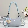 2026 Nuevo Bolso Cruzado de Hombro y Axila con Colgante Mini de Media Luna con Patrón Tejido