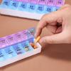 Caja de medicamentos de doble fila de 14 compartimentos, caja de medicamentos pequeña portátil, caja de medicamentos para empacar por separado de 7 días, caja de medicamentos de una semana, salida de fábrica