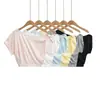 680-26 Verano estilo coreano ajustado INS hombros descubiertos ligeramente transparente fino holgado pura deseo manga corta camiseta base