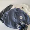 Camisas Infantis Mabao 2026 Outono Novo Estilo Coreano Camisas de Manga Longa Xadrez Infantis para Crianças Pequenas Tops de Primavera Tendência