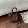 Bolsa feminina de camurça 2026 nova verão vintage Maillard bolinhas cesta bolsa de mão bolsa de ombro transversal