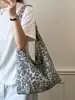 Bolso tote nuevo estilo coreano con estampado de leopardo, bolso de hombro de lona moderno y versátil, bolso cubo camuflaje estilo casual para estudiante escolar