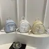 Mochila de Estilo Girly de Gama Alta para Mujer Verano 2026 Nueva Moda Versátil Diaria Linda Pequeña Mochila para Estudiante