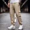 Pantalones casuales para hombre transfronterizos, pantalones cargo holgados multibolsillos, pantalones deportivos de punto jacquard texturizado de moda para hombre