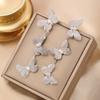 Pendientes de circonita de lujo de alta gama, ligeros, con borlas de mariposa y aguja de plata S925, elegantes pendientes combinables con todo para mujer.