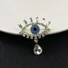 Broche de Ojo del Diablo Estilo Coreano de Lujo Transfronterizo Diamante Azul Diseño de Nicho Broche de Ojo Exquisito Pin de Pedrería