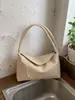 Bolsa de nicho transfronteiriça estilo francês feita à mão para mulheres, nova bolsa de ombro versátil casual 2026, bolsa tote simples para o dia a dia