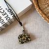 Bolso pequeño vintage marrón con estampado de leopardo, collar para mujer, cadena larga de lana para otoño e invierno, auriculares, monedero, accesorios colgantes