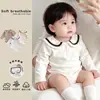 Enterizo estilo preppy para bebé niña 2026 nueva ropa infantil mameluco de manga larga mameluco de bebé estilo coreano