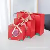 Fabricantes Transfronterizos Artículos en Stock al por Mayor: Bolsos de Personaje de la Suerte, Bolsas de Regalo Festivas, Bolsas de Papel, Bolsas de Empaque, Bolsas de Regalo de Cumpleaños