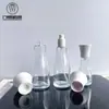 En stock juego transparente botella 120ml100ml30ml loción de agua esencia juego de botellas 50g crema botella vacía dividida